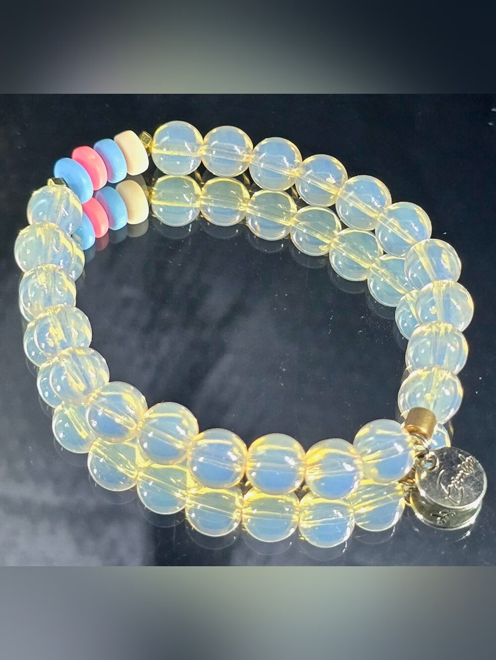 Erimish stackable clear glass bead bracelet with Pink, Blue, and White Accents